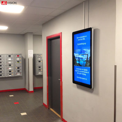 Eine 32 Zoll-Innendigitale beschilderung JCVISION zeigt an der Wand befestigten LCD-Werbungs-Spieler an